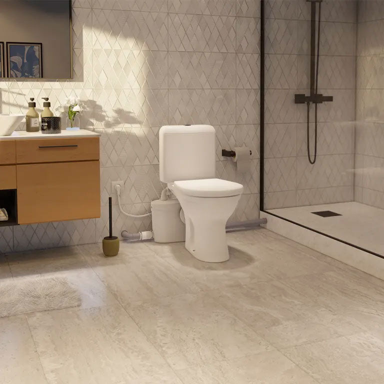 Broyeur Sanibroyeur XR Up Silence de SFA, adaptable pour WC, avec moteur silencieux et design compact.