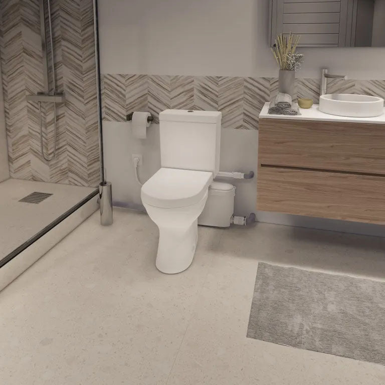 Broyeur Sanibest Pro SFA pour WC, adaptable, avec moteur puissant et système de broyage pour installations sanitaires.