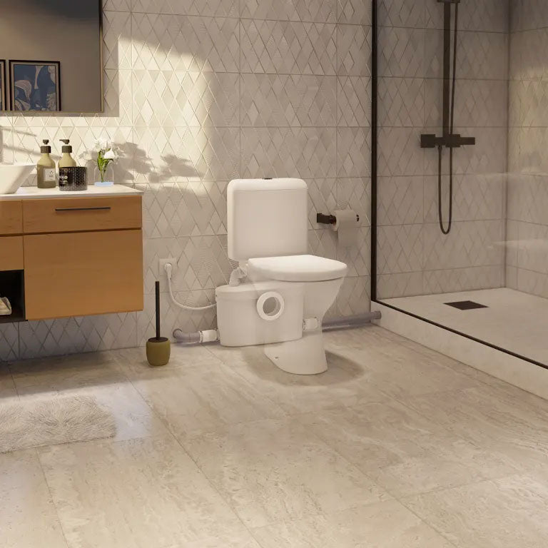 Broyeur Sanibroyeur XR Up Silence de SFA, adaptable pour WC, avec moteur silencieux visible en image.
