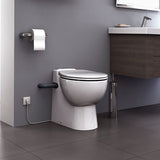 WC japonais blanc marque Grohe avec abattant électronique, installé dans une salle de bain moderne.
