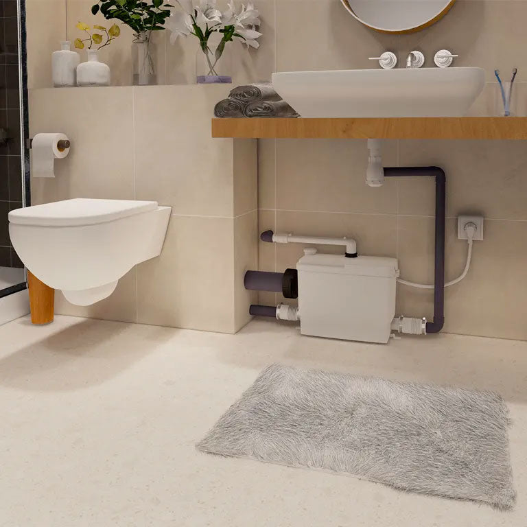 Broyeur WC Sanipack Pro Up Silencieux de SFA avec 3 entrées, pièce pour toilettes, design compact et silencieux.