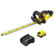 Taille-haie Stanley jaune et noir avec batterie et chargeur, outil de jardin sans fil.