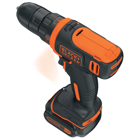 Perceuse visseuse Black & Decker, outil électroportatif noir et orange.