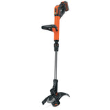 Coupe-bordure Black+Decker, outil de jardinage, couleur orange et noir.